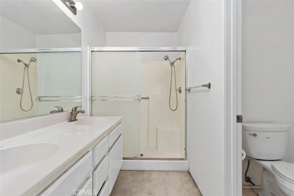 2800 Plaza Del Amo, Unit 375 Torrance, CA 90503 - Photo 16 of 24 a bathroom with a sink a toilet and shower