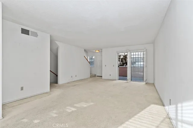 an empty room with an entryway