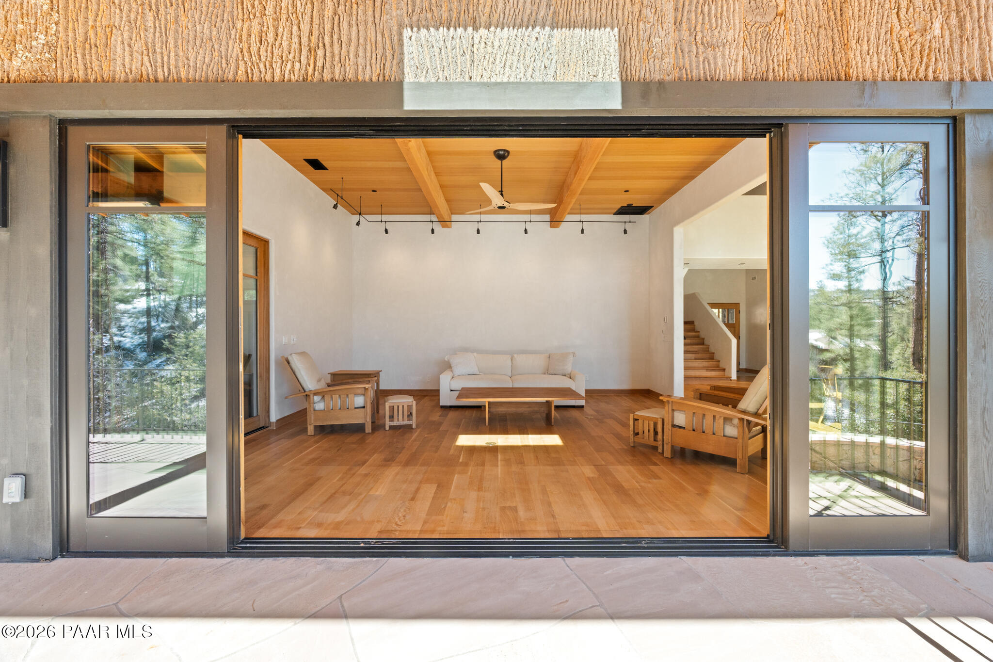 1090 High Valley Ranch Road Prescott, AZ 86303 - Photo 23 of 65 Living Glass wall open outside