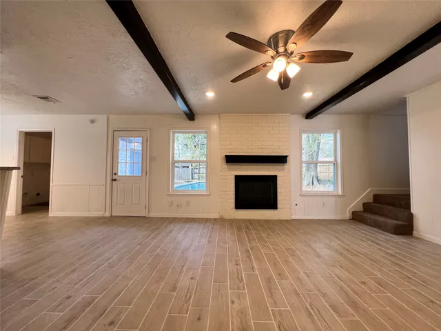 a kitchen with granite countertop a stove and a sink