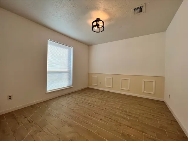 a kitchen with stainless steel appliances granite countertop a sink and a stove