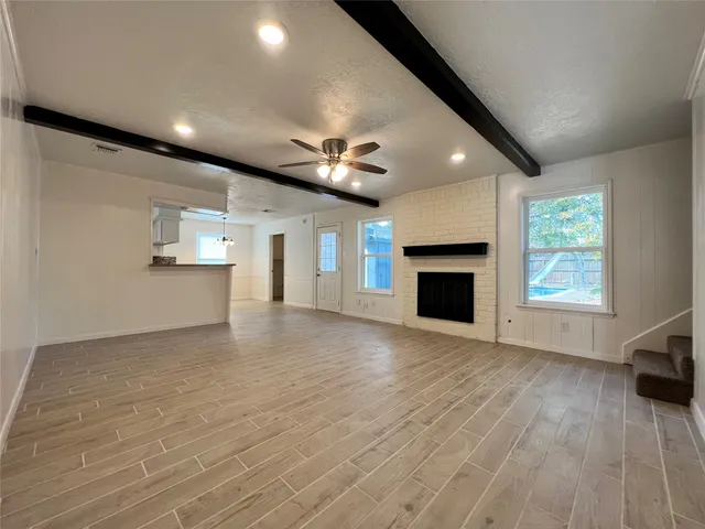 a kitchen with stainless steel appliances granite countertop a sink and stove top oven