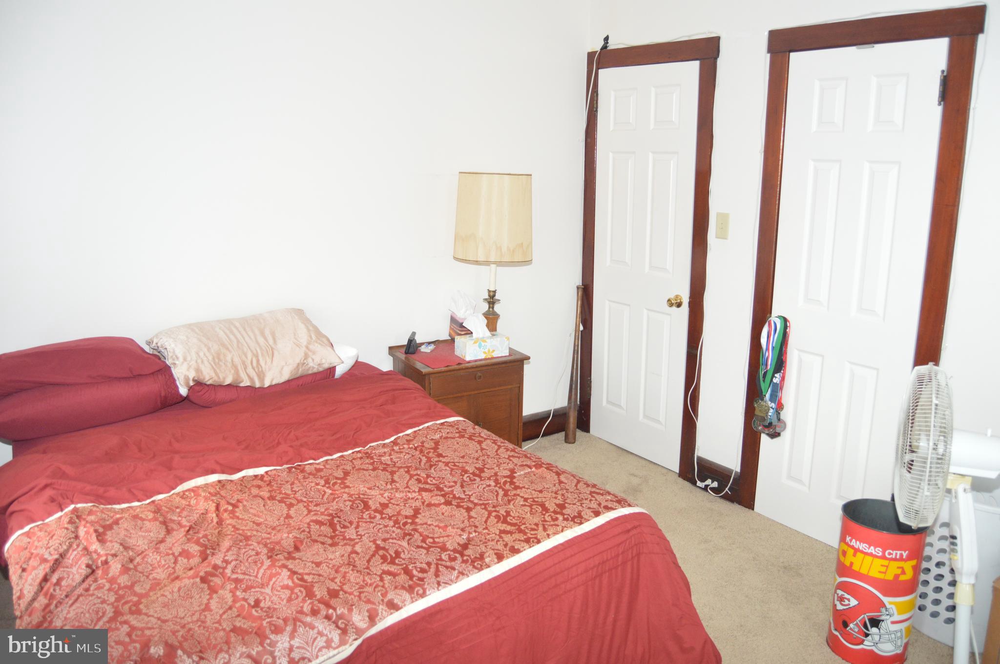 4715 Kutztown Road Temple, PA 19560 - Photo 13 of 28 a bedroom with a bed and a window