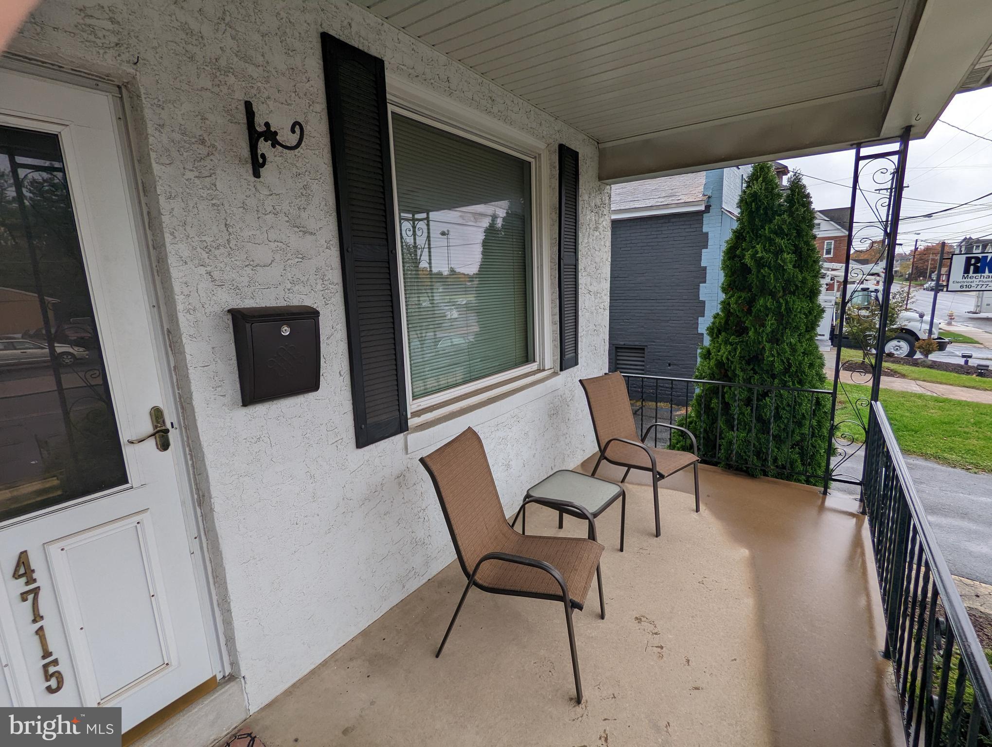 4715 Kutztown Road Temple, PA 19560 - Photo 24 of 28 a view of a patio with a table and chairs