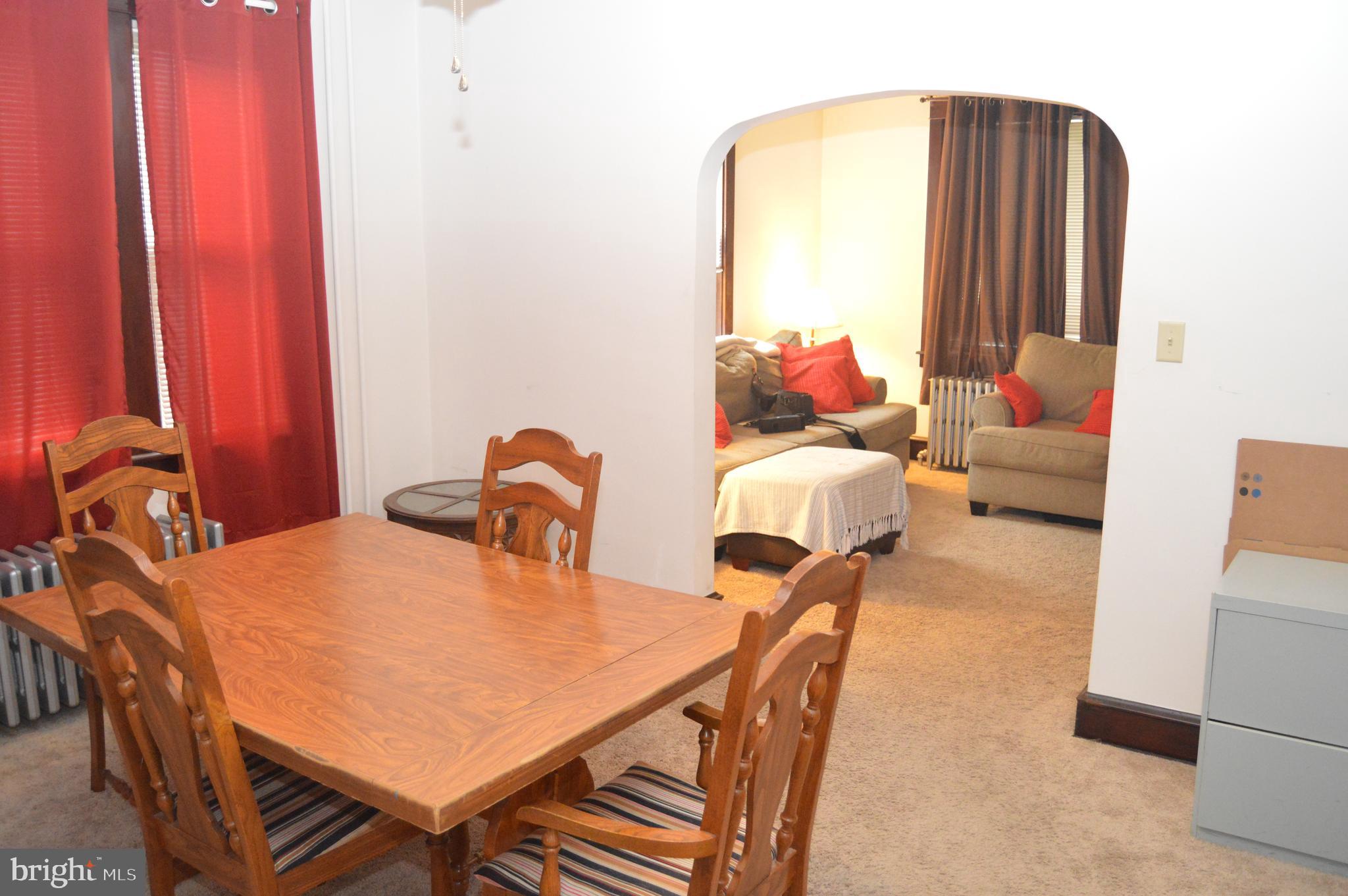 4715 Kutztown Road Temple, PA 19560 - Photo 7 of 28 a dining room with furniture and a window