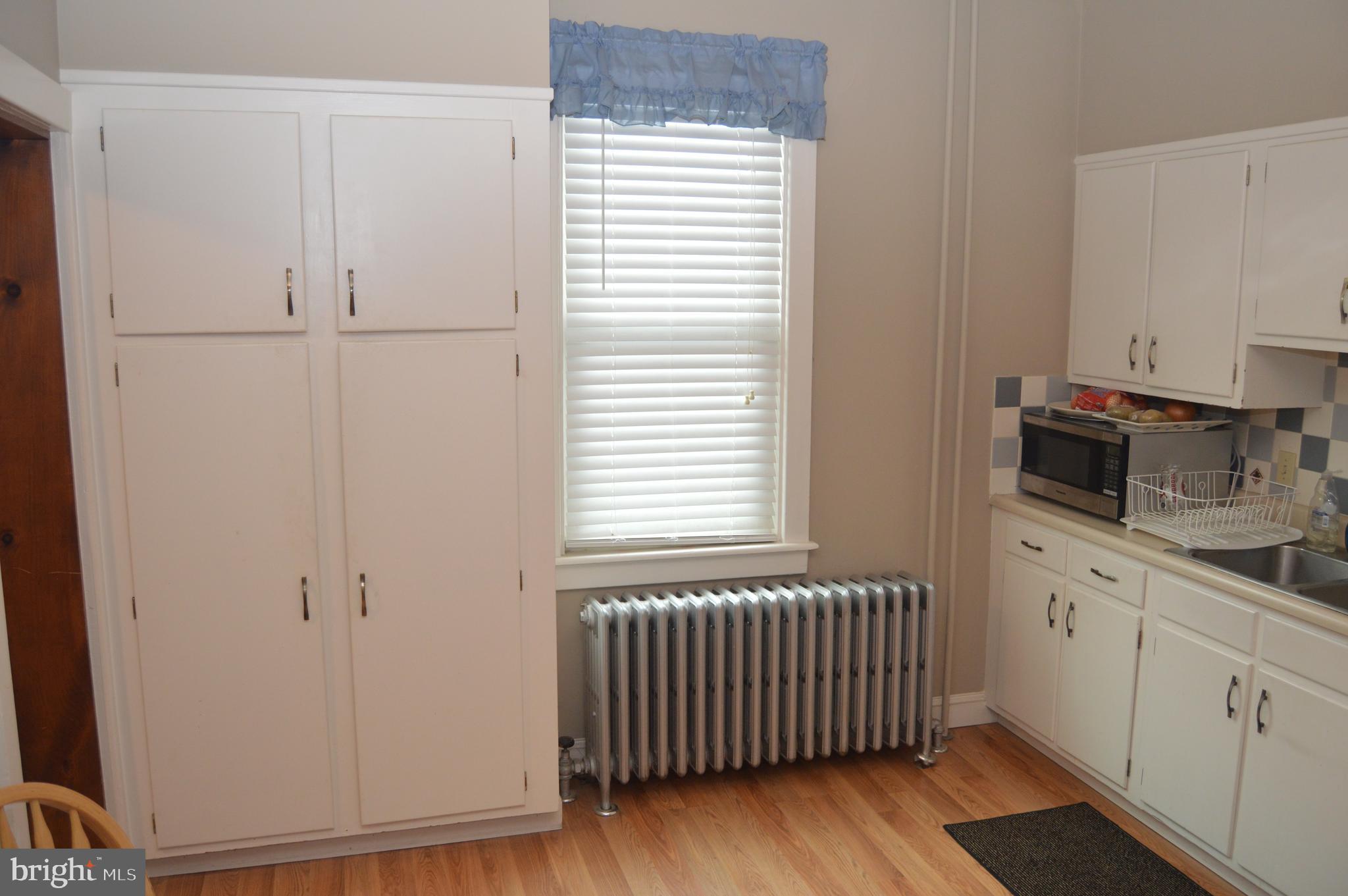 4715 Kutztown Road Temple, PA 19560 - Photo 8 of 28 a bedroom with a bed and a window