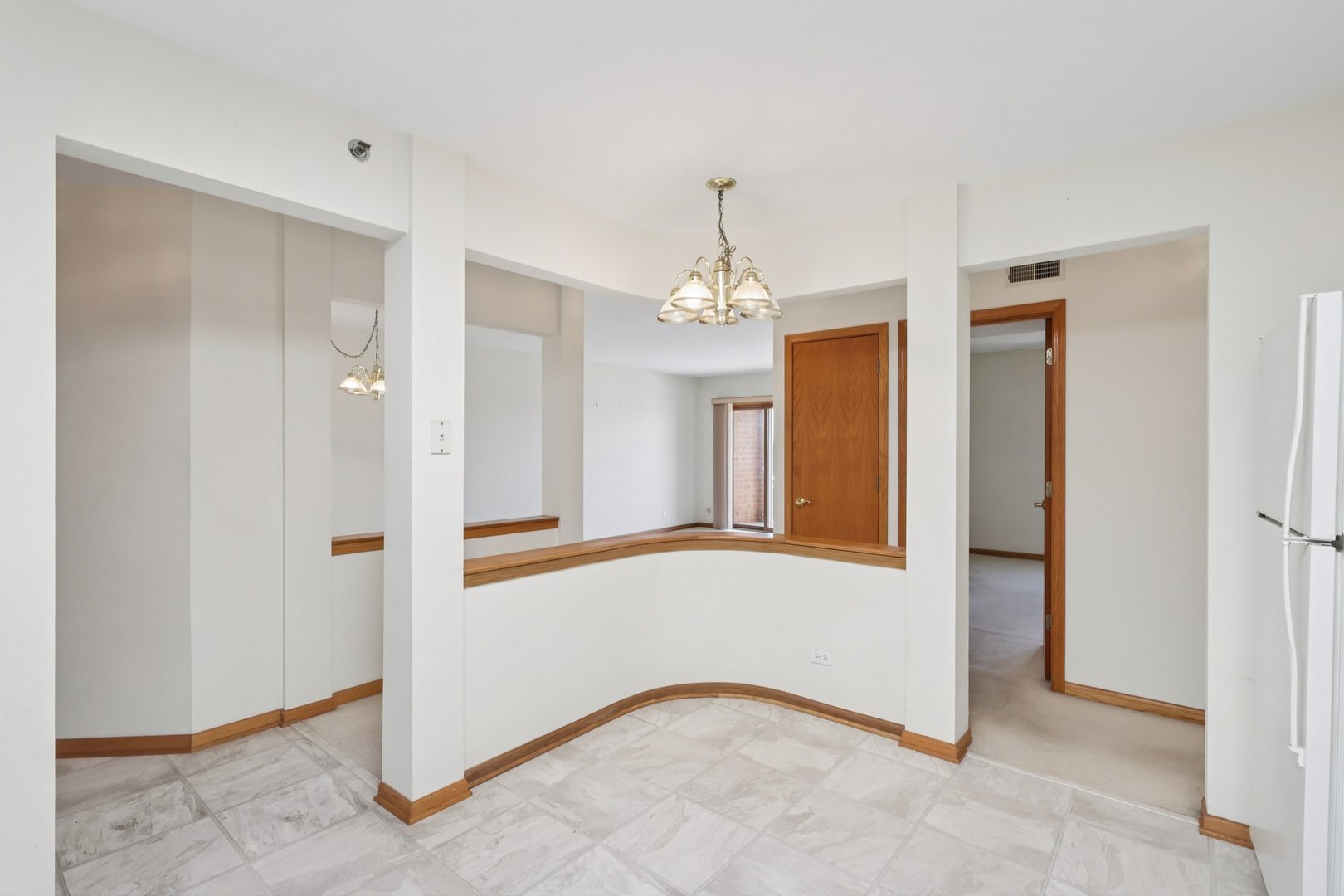 7450 North Waukegan Road, Unit 505 Niles, IL 60714 - Photo 11 of 30 a view of an empty room with a window