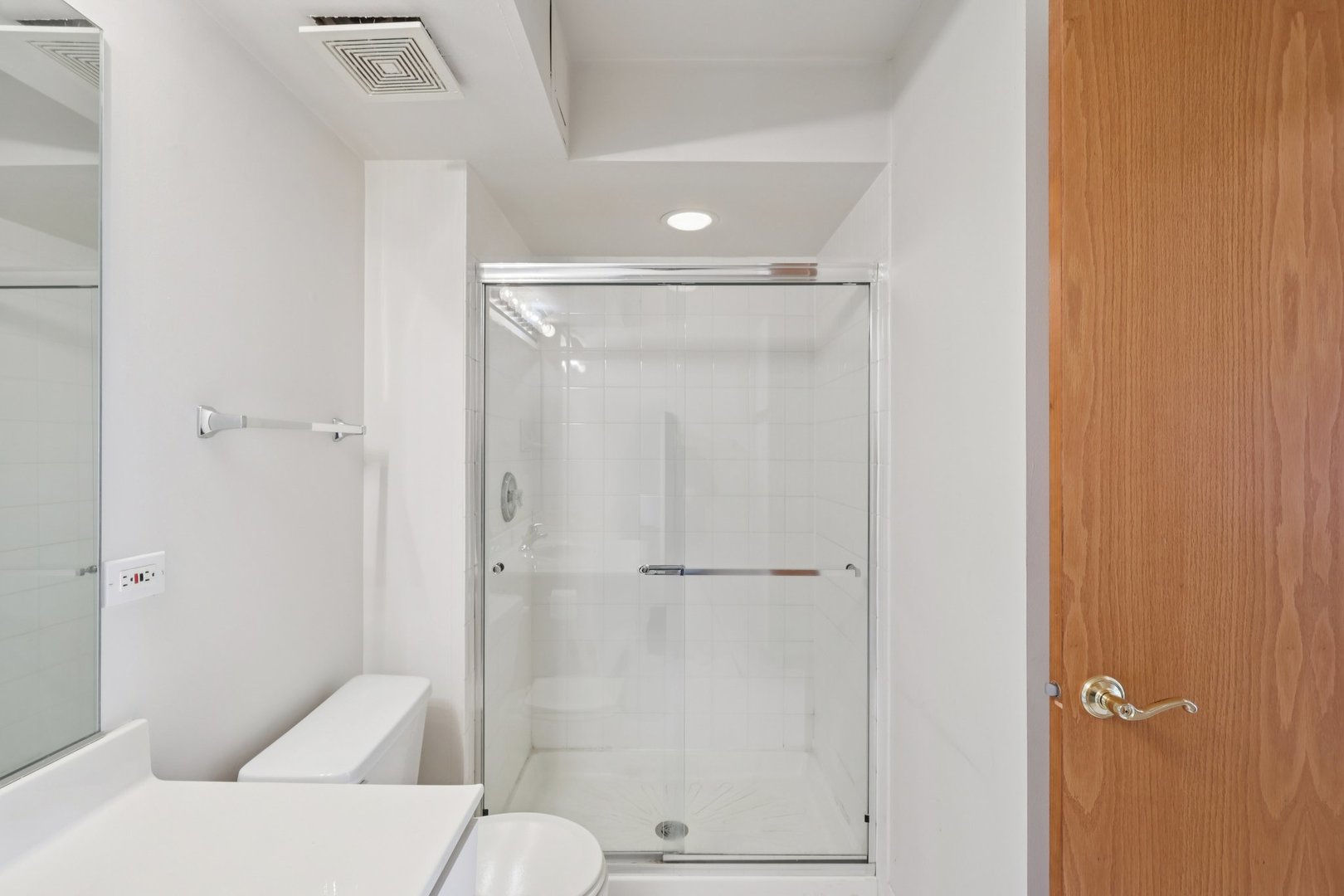 7450 North Waukegan Road, Unit 505 Niles, IL 60714 - Photo 19 of 30 a bathroom with a shower