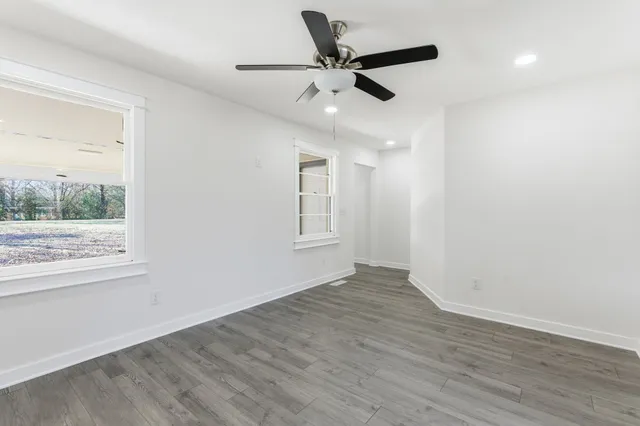 a bathroom with a sink and vanity