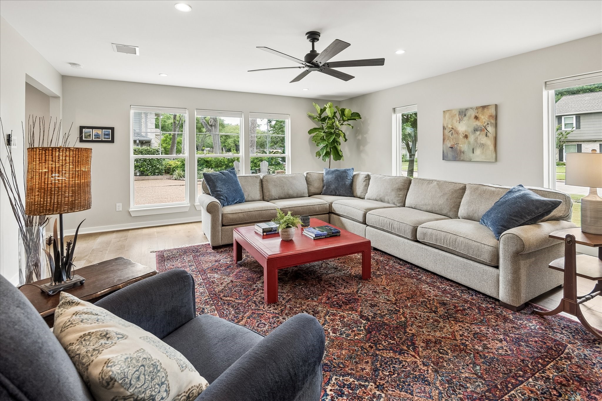 1059 Candlelight Lane Houston, TX 77018 - Photo 15 of 35 a living room with furniture a large window and a rug