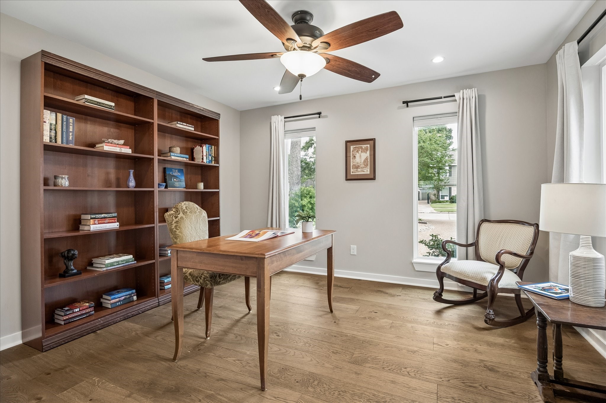 1059 Candlelight Lane Houston, TX 77018 - Photo 19 of 35 a view of a livingroom with workspace and a window
