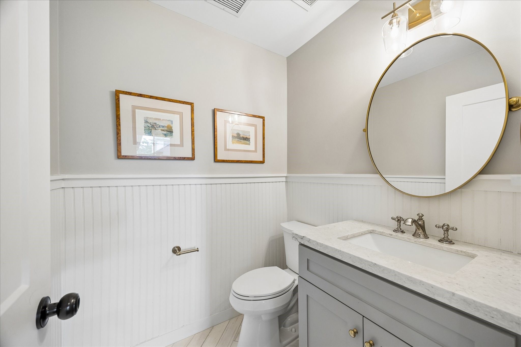 1059 Candlelight Lane Houston, TX 77018 - Photo 22 of 35 a bathroom with a granite countertop toilet sink and mirror