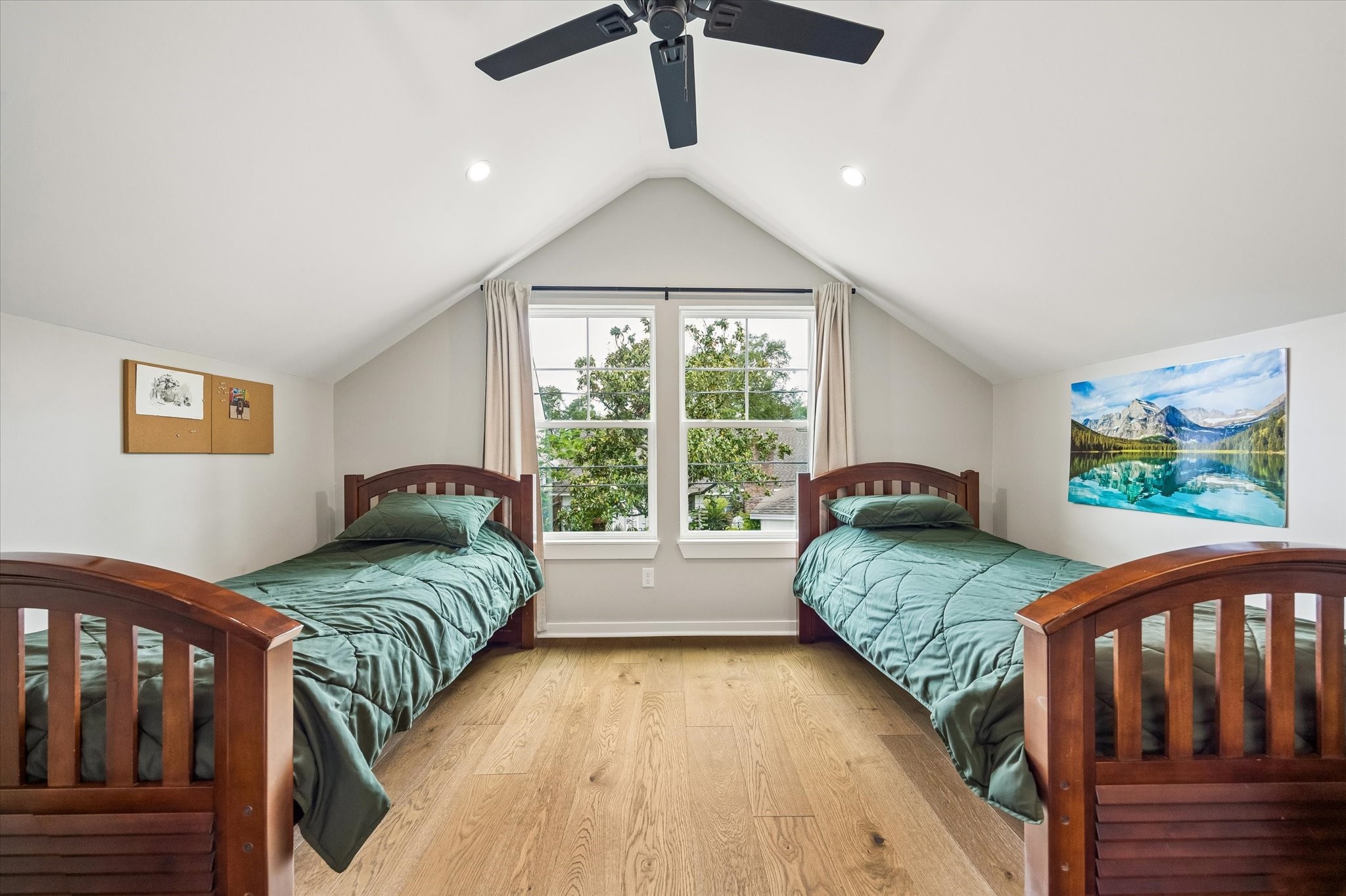1059 Candlelight Lane Houston, TX 77018 - Photo 25 of 35 a bedroom with a bed and a large window