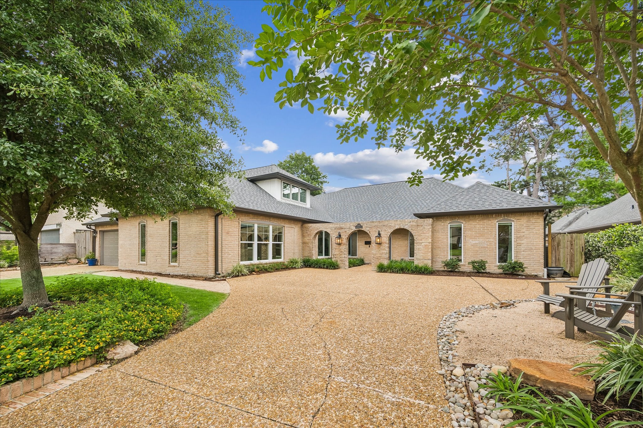 1059 Candlelight Lane Houston, TX 77018 - Photo 34 of 35 a front view of a house with a yard and trees