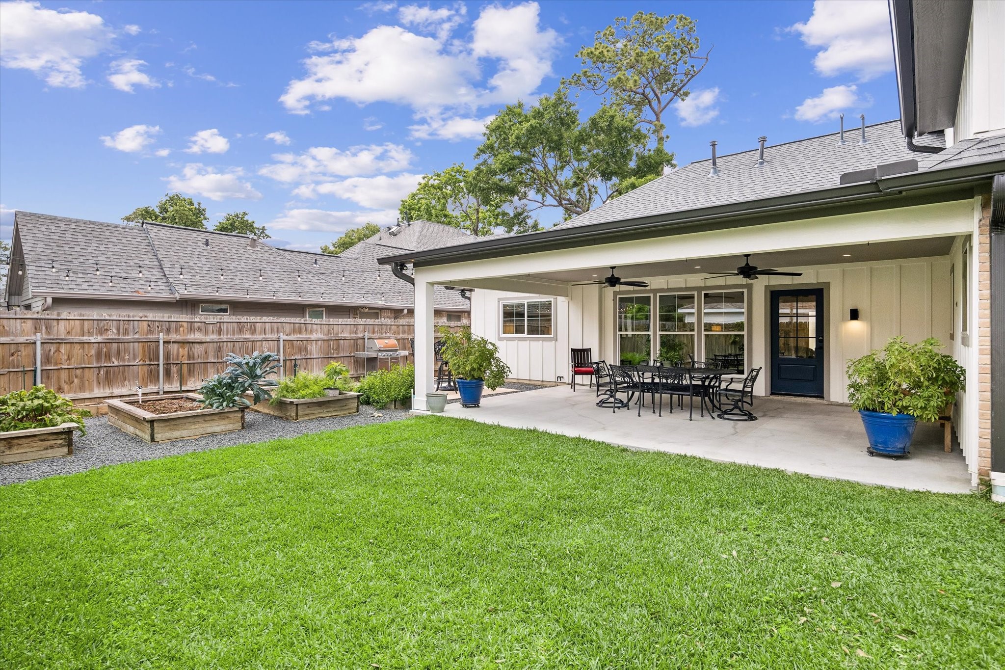 1059 Candlelight Lane Houston, TX 77018 - Photo 7 of 35 a view of a house with backyard porch and sitting area