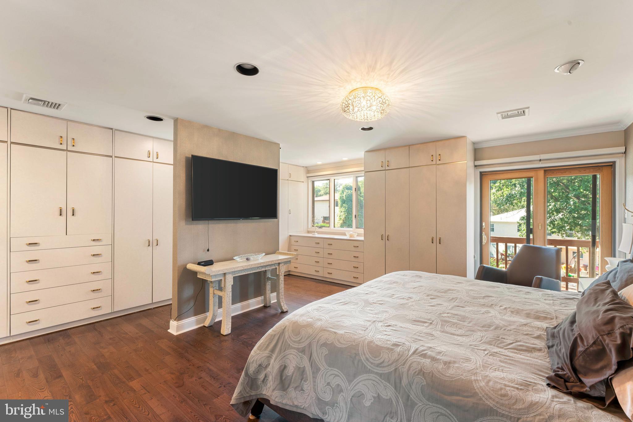 3843 Loop Road Huntingdon Valley, PA 19006 - Photo 26 of 51 a bedroom with a bed and a flat screen tv