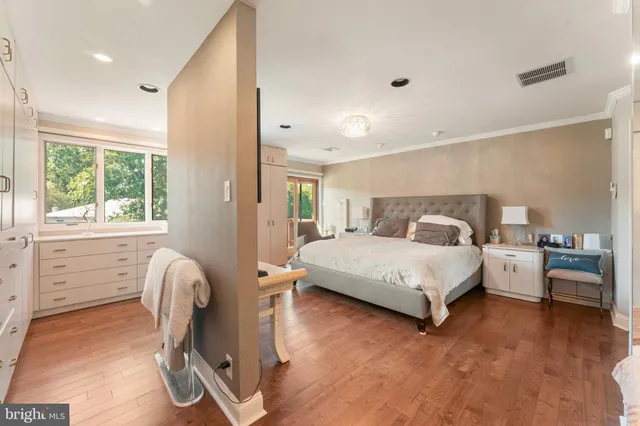 a very nice looking room with wooden floor