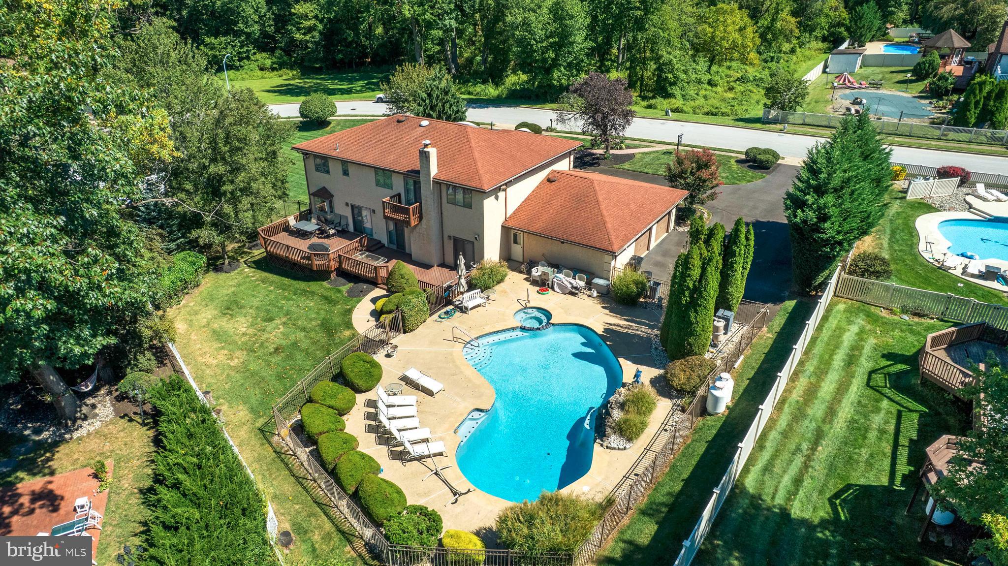 3843 Loop Road Huntingdon Valley, PA 19006 - Photo 42 of 51 an aerial view of a house with yard swimming pool and outdoor seating