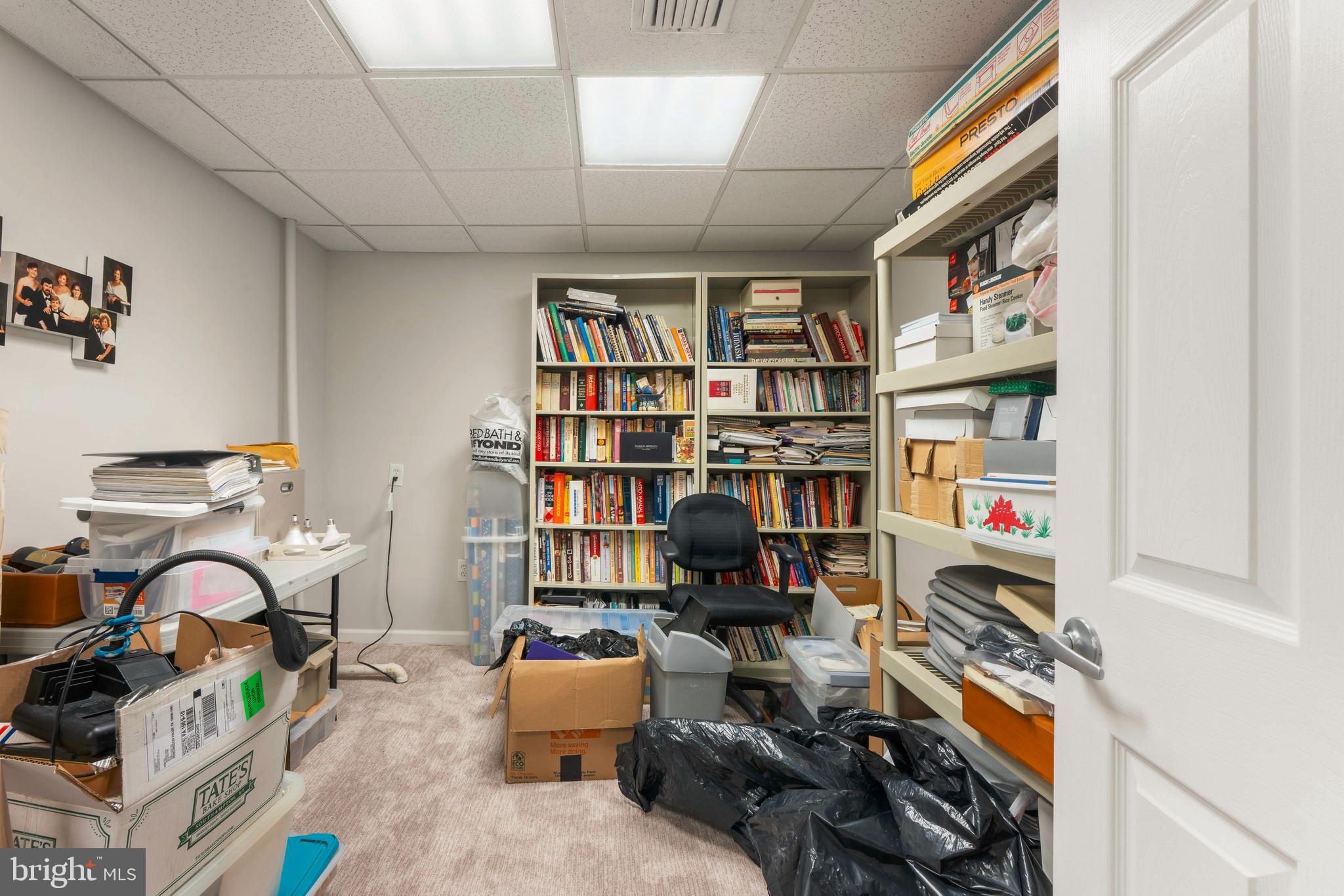 3843 Loop Road Huntingdon Valley, PA 19006 - Photo 48 of 51 a room with furniture a book shelf and a book shelf