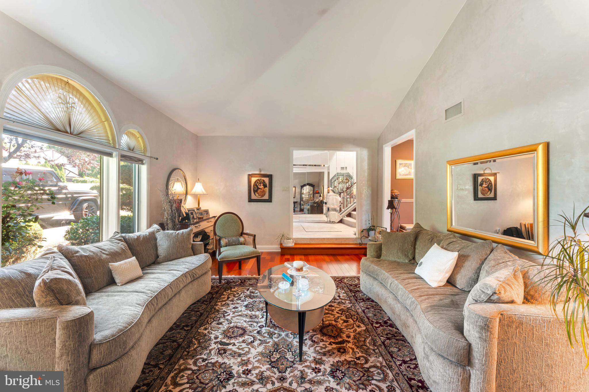 3843 Loop Road Huntingdon Valley, PA 19006 - Photo 8 of 51 a living room with furniture and a large window
