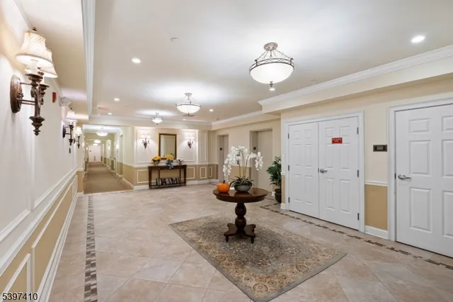 a room with lots of chairs and mirrors