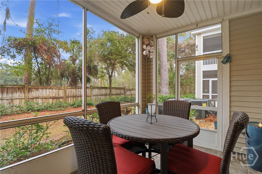 18 River Walk, Unit 18 Savannah, GA 31410 - Photo 4 of 27 Cozy screen porch with utility room and quiet outdoor space