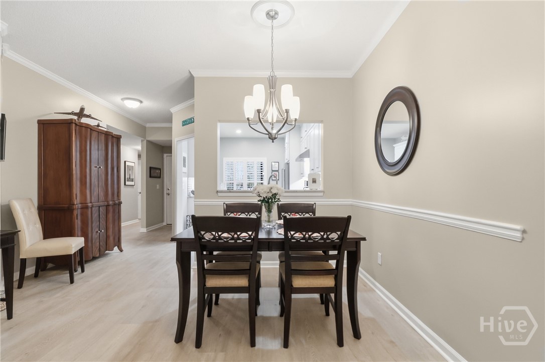 18 River Walk, Unit 18 Savannah, GA 31410 - Photo 8 of 27 Crown molding and custom trim. All new flooring and paint.