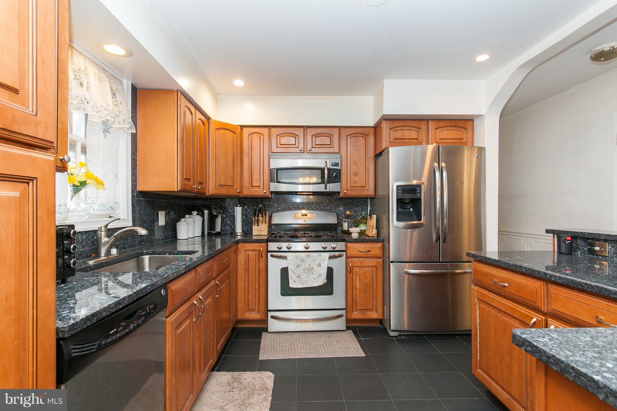 5021 Ox Road Fairfax, VA 22032 - Photo 10 of 30 Kitchen w/ newer cabinets & ceramic tile
