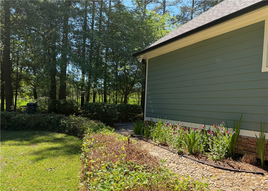 232 Hunters Trail Walhalla, SC 29691 - Photo 31 of 38 This serene property offers a picturesque side yard with lush greenery.