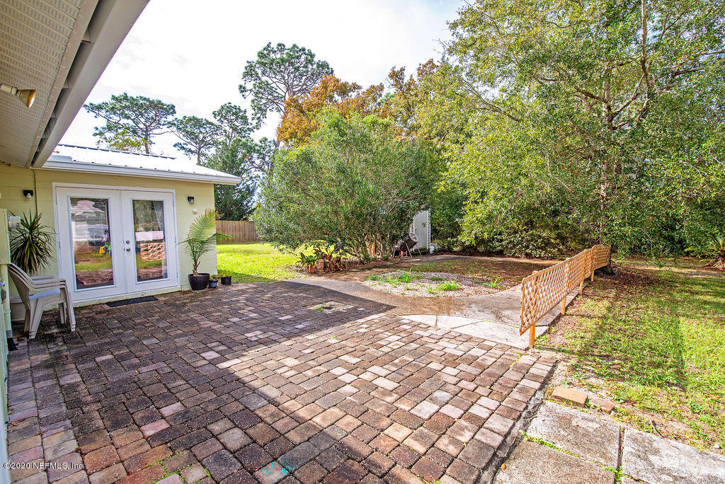 843 Viscaya Boulevard St. Augustine, FL 32086 - Photo 16 of 33 a view of a house with backyard and a patio
