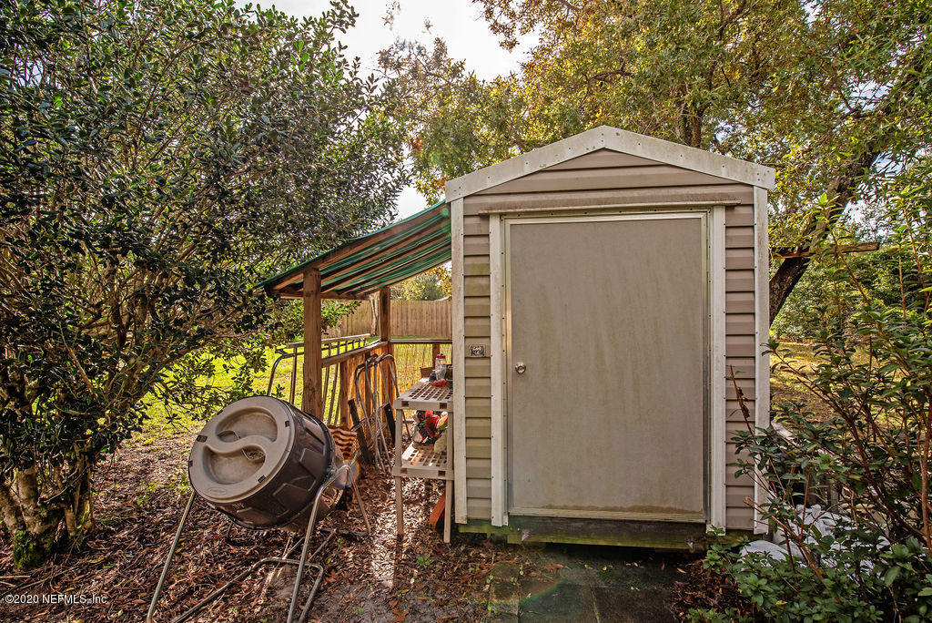 843 Viscaya Boulevard St. Augustine, FL 32086 - Photo 27 of 33 a front view of a house with garden