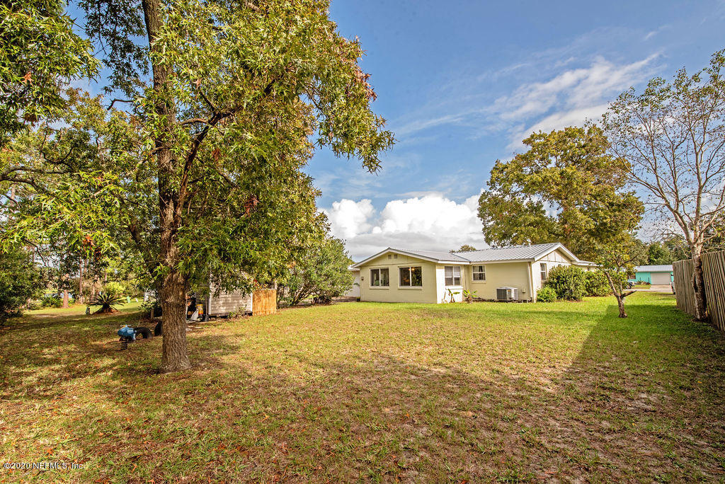843 Viscaya Boulevard St. Augustine, FL 32086 - Photo 32 of 33 a view of outdoor space with garden
