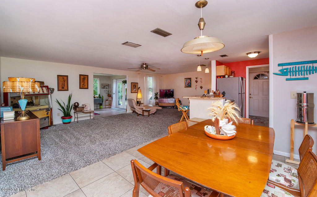 843 Viscaya Boulevard St. Augustine, FL 32086 - Photo 4 of 33 a view of a dining room with furniture