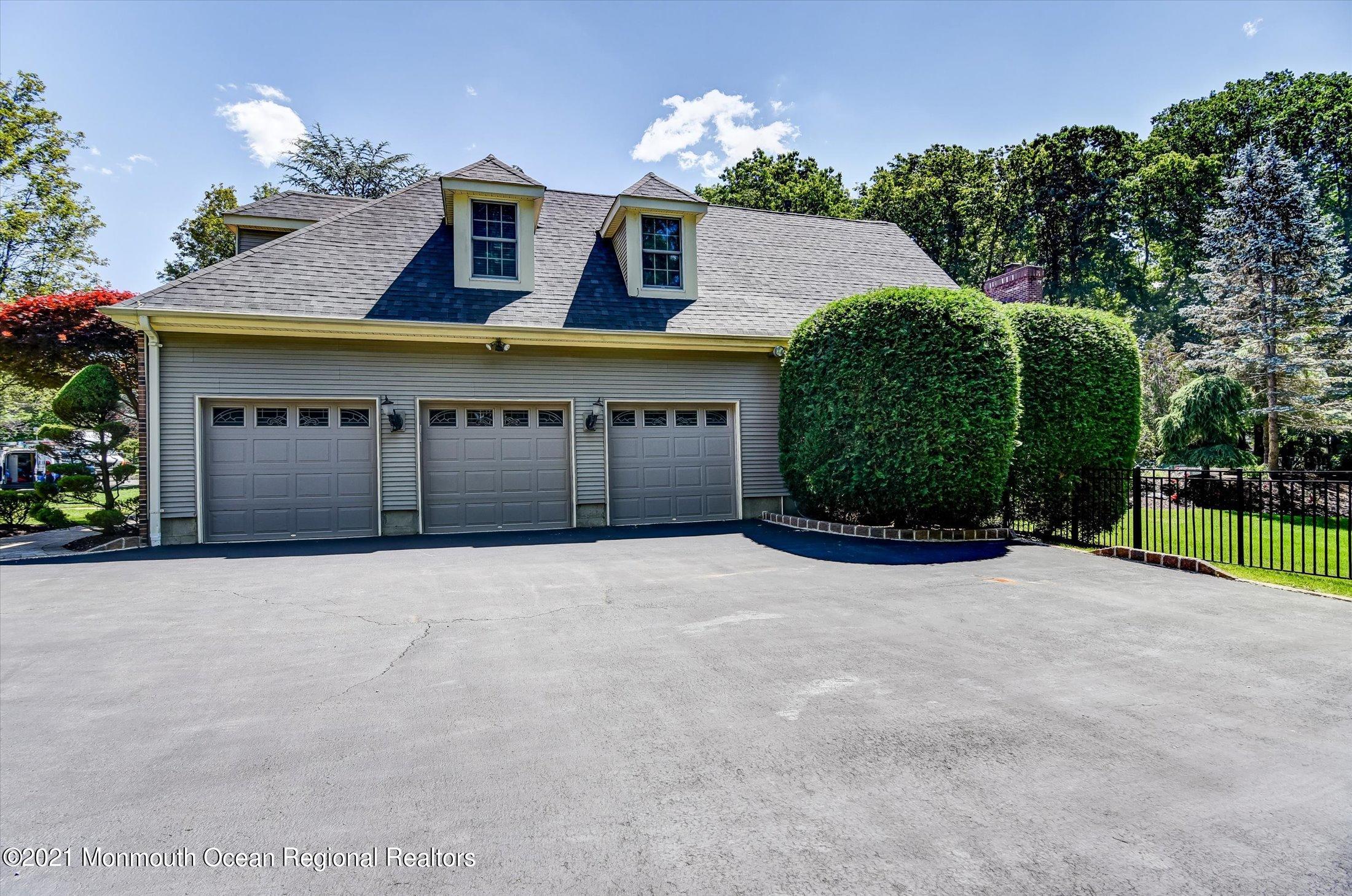 239 Yellowknife Road Morganville, NJ 07751 - Photo 4 of 44 04-Side View