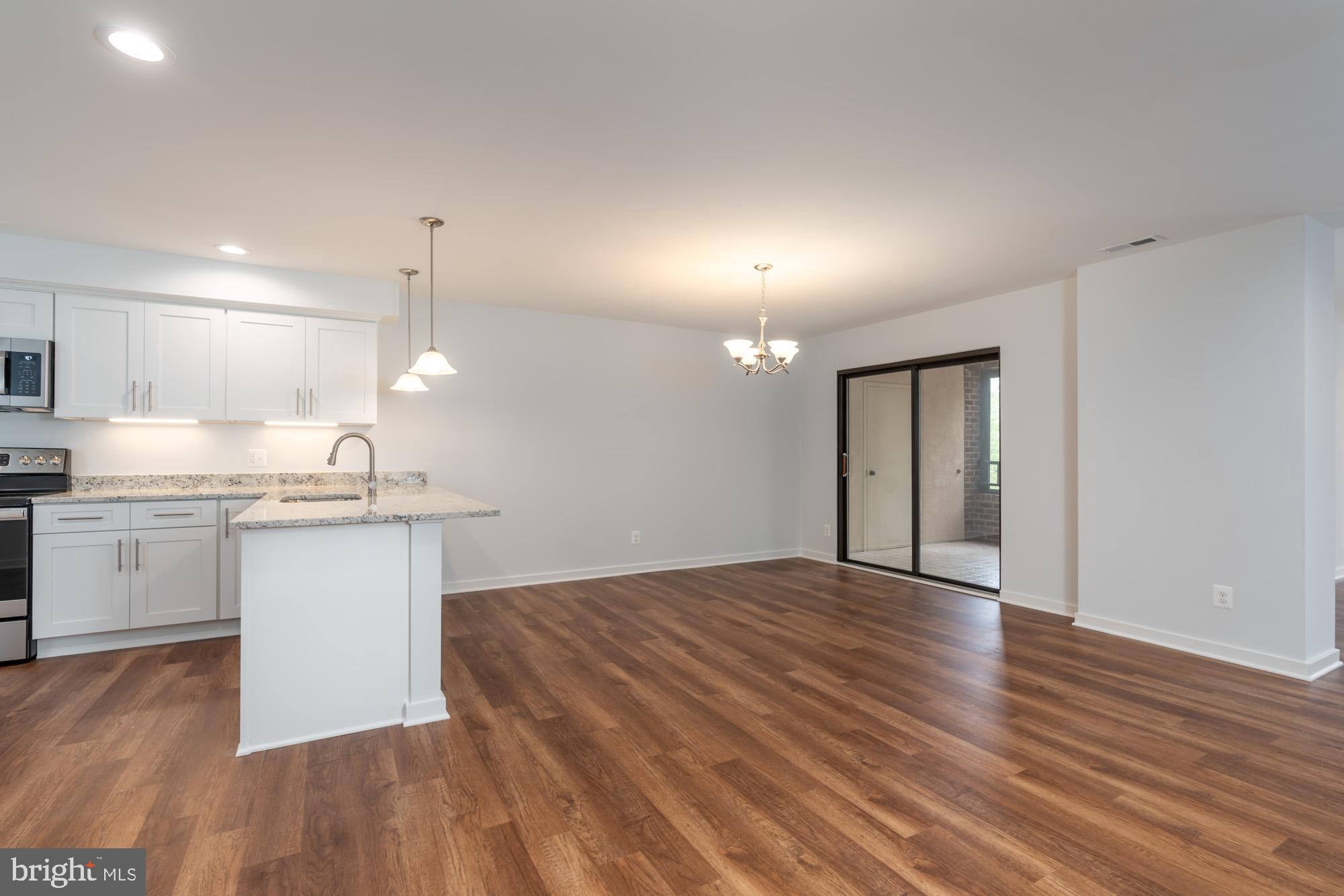 11500 Fairway Drive, Unit 401 Reston, VA 20190 - Photo 2 of 36 Dining Room and Breakfast Bar