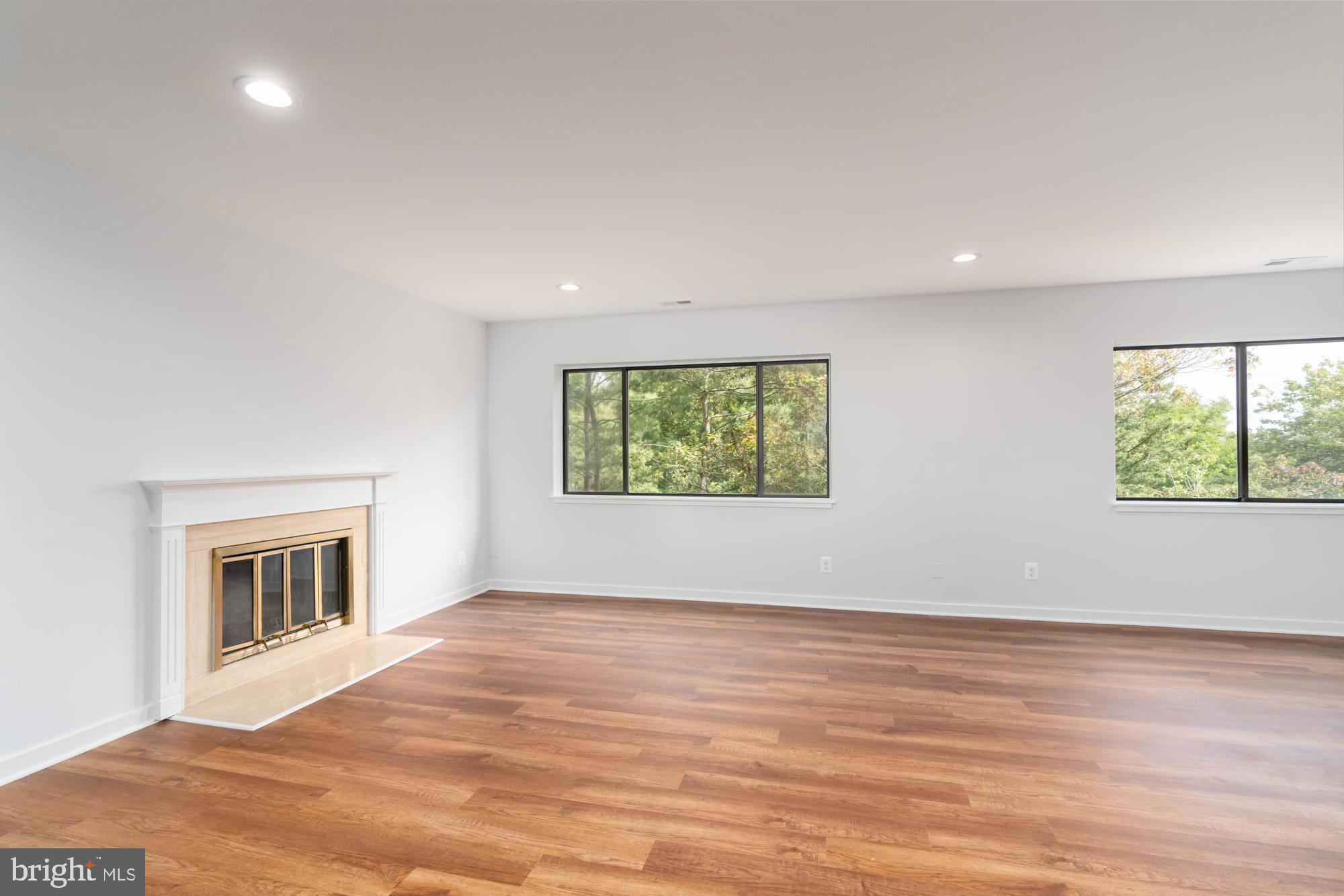 11500 Fairway Drive, Unit 401 Reston, VA 20190 - Photo 11 of 36 Family Room with Fireplace