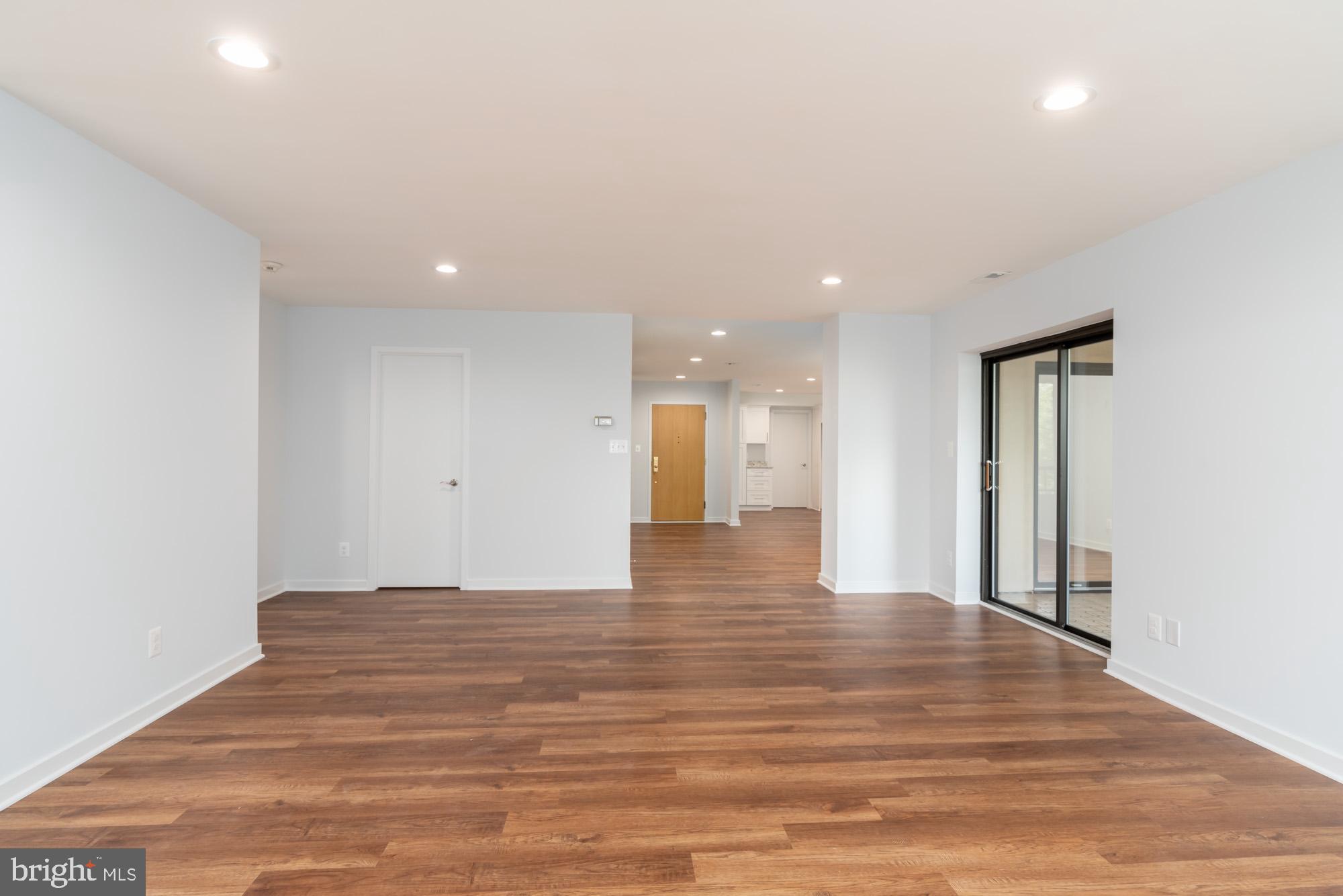 11500 Fairway Drive, Unit 401 Reston, VA 20190 - Photo 14 of 36 Family Room looking to foyer