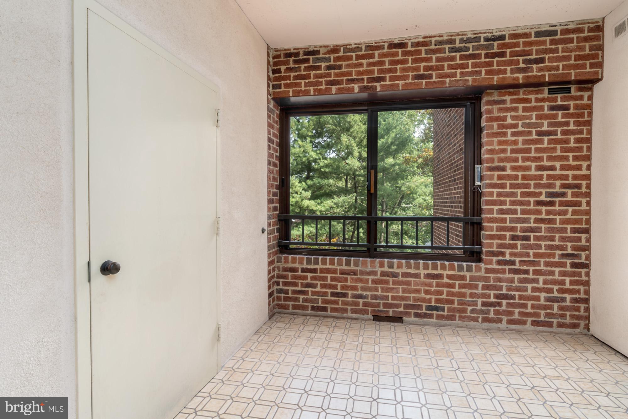 11500 Fairway Drive, Unit 401 Reston, VA 20190 - Photo 18 of 36 Sun Room with storage