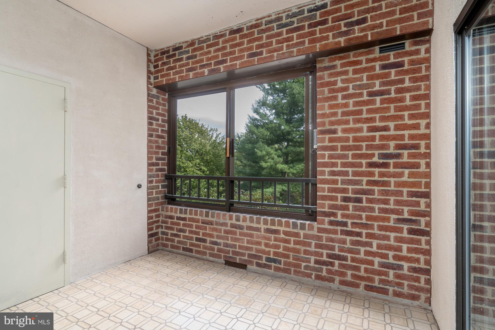 11500 Fairway Drive, Unit 401 Reston, VA 20190 - Photo 19 of 36 Sun Room with storage