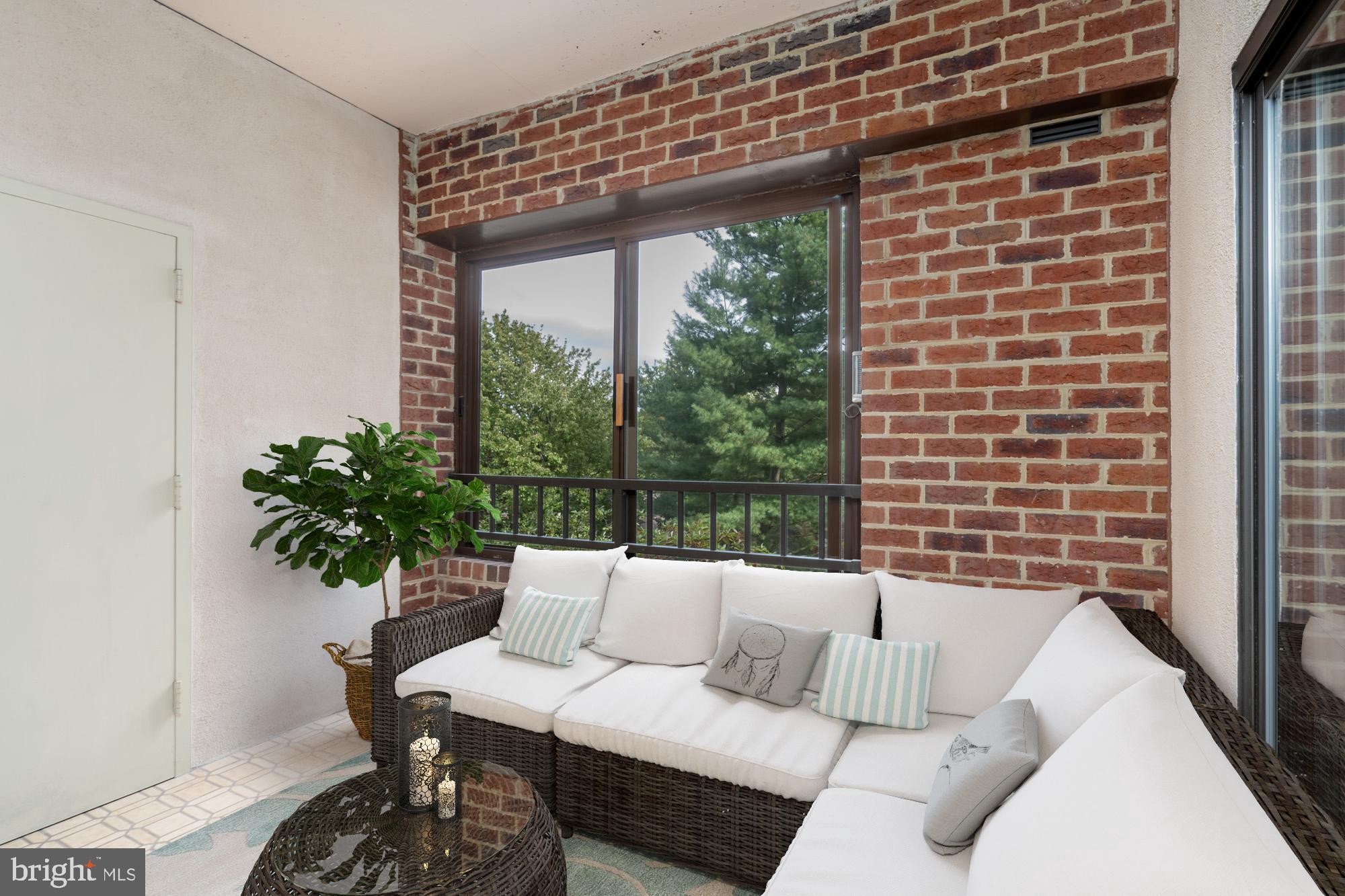 11500 Fairway Drive, Unit 401 Reston, VA 20190 - Photo 20 of 36 Visualize the sunroom with this image.