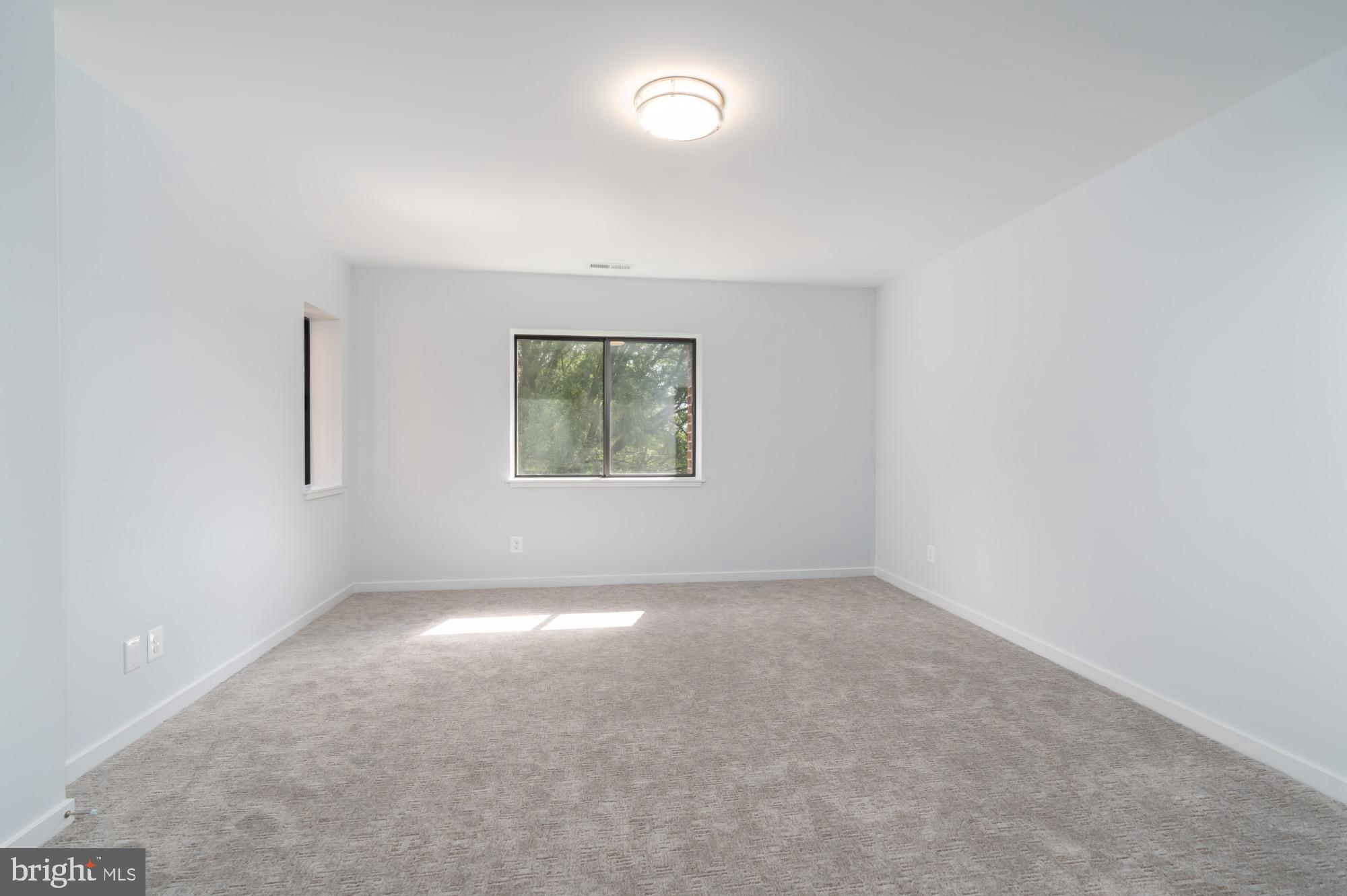 11500 Fairway Drive, Unit 401 Reston, VA 20190 - Photo 27 of 36 Primary Bedroom with en suite