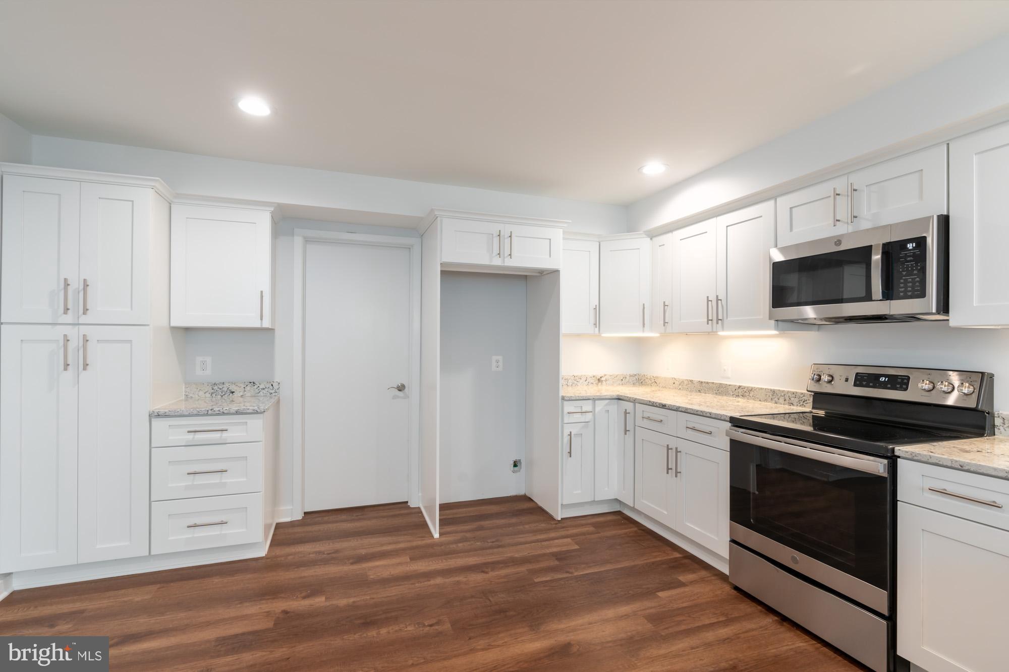 11500 Fairway Drive, Unit 401 Reston, VA 20190 - Photo 4 of 36 New Kitchen with Samsung refrigerator on the way