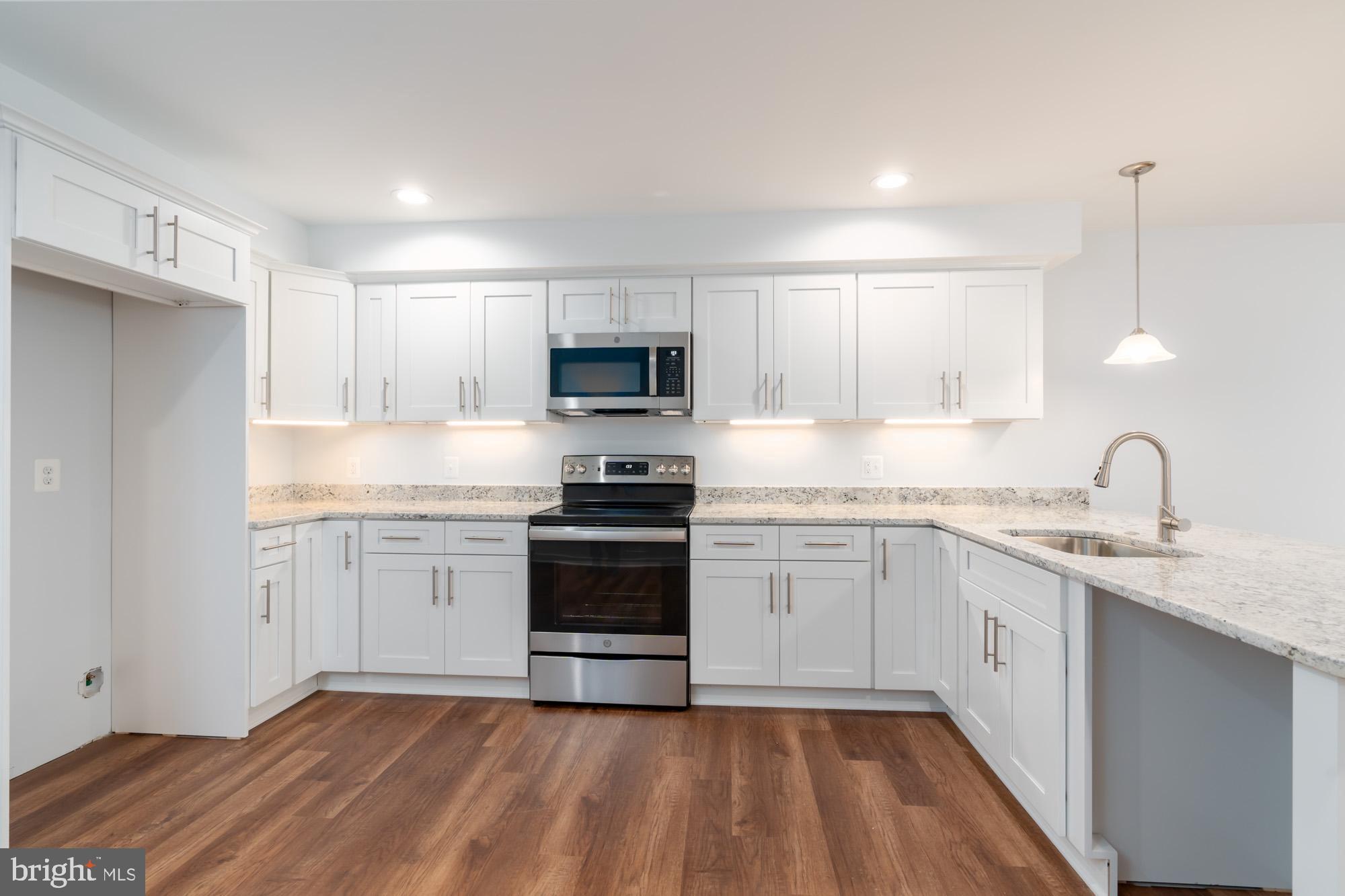 11500 Fairway Drive, Unit 401 Reston, VA 20190 - Photo 5 of 36 New kitchen with new GE Dishwasher on the way