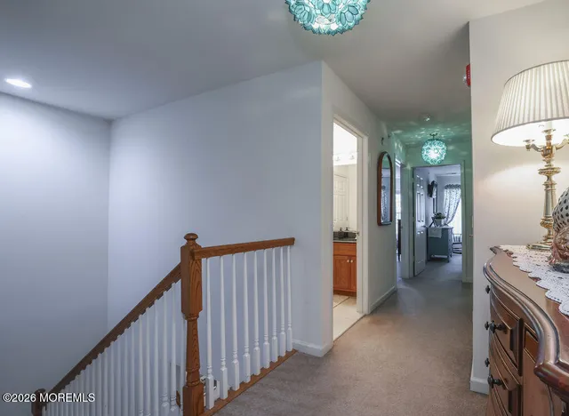 a view of hallway with livingroom