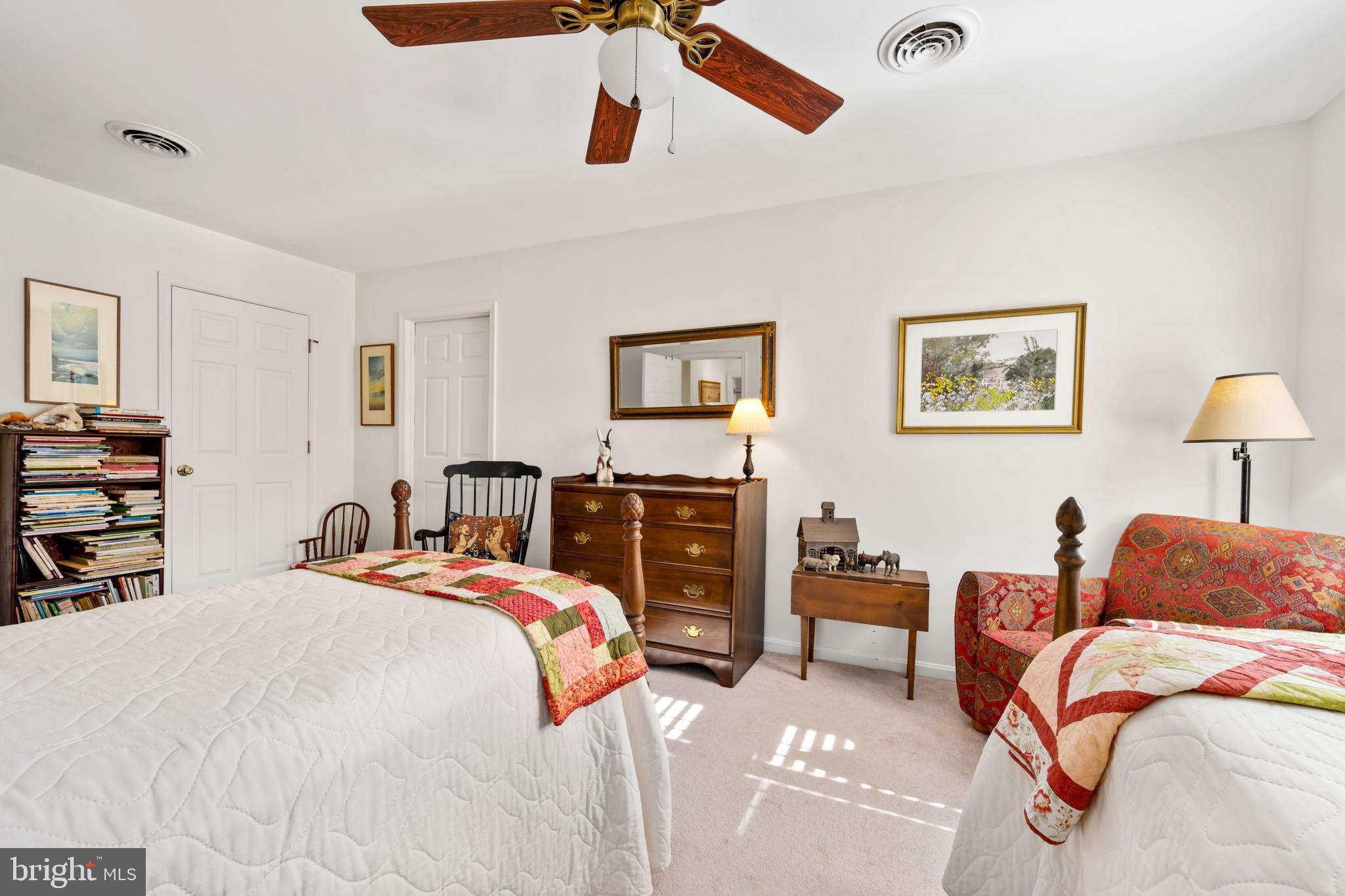 7844 Chester Court Chestertown, MD 21620 - Photo 29 of 51 a bedroom with a bed closet and flat tv screen