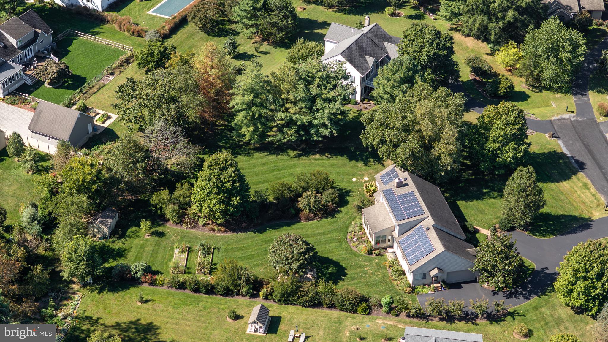 7844 Chester Court Chestertown, MD 21620 - Photo 46 of 51 an aerial view of a house with a yard and outdoor seating