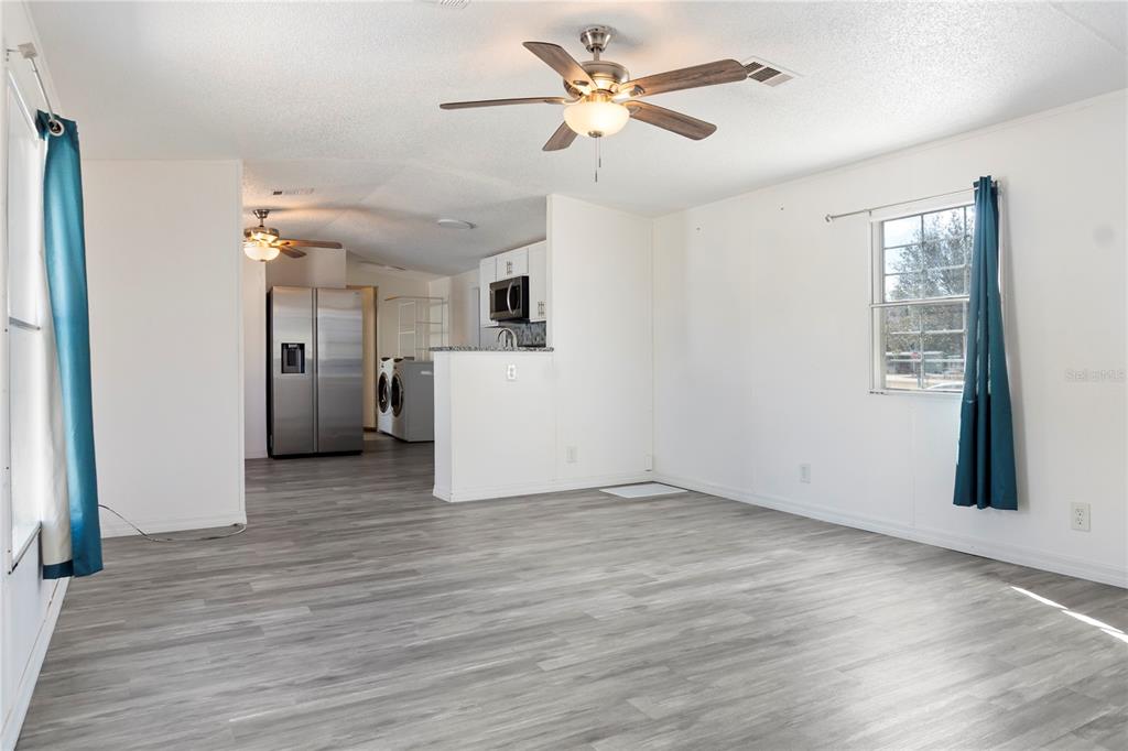 6526 Jack Street Punta Gorda, FL 33982 - Photo 4 of 19 a view of an empty room with a window