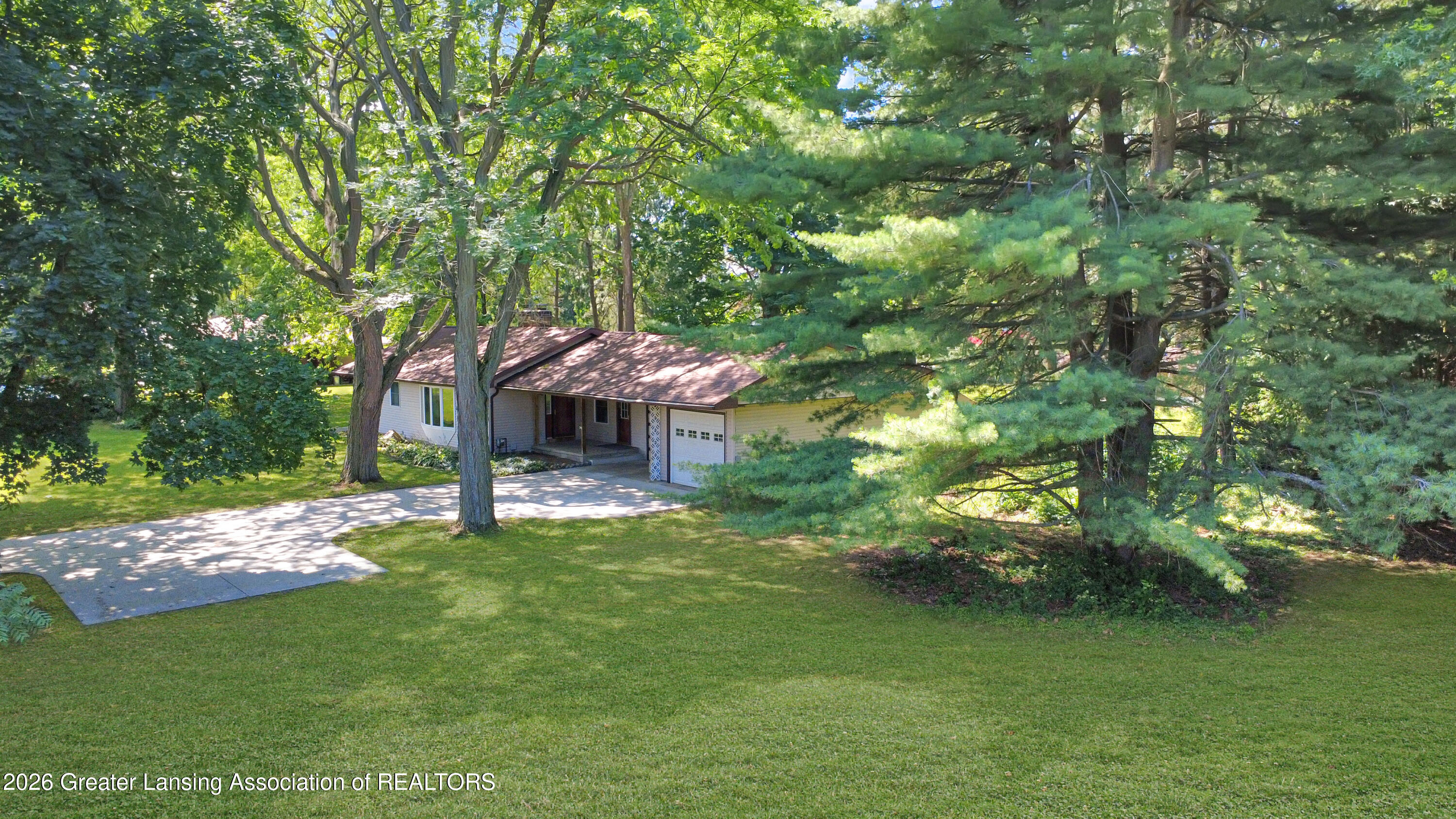 7702 Woodbury Road Laingsburg, MI 48848 - Photo 5 of 37 Front