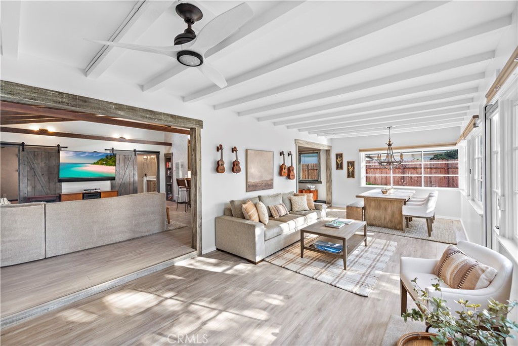 1209 C. Toledo San Clemente, CA 92672 - Photo 22 of 47 a living room with furniture and a large window