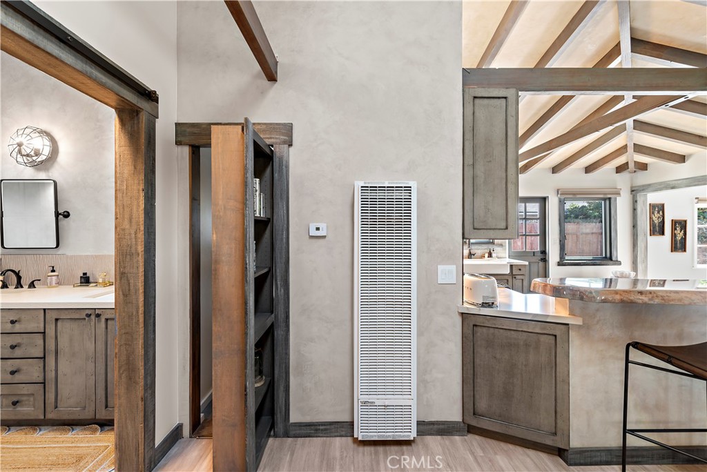 1209 C. Toledo San Clemente, CA 92672 - Photo 29 of 47 a kitchen with refrigerator and cabinets